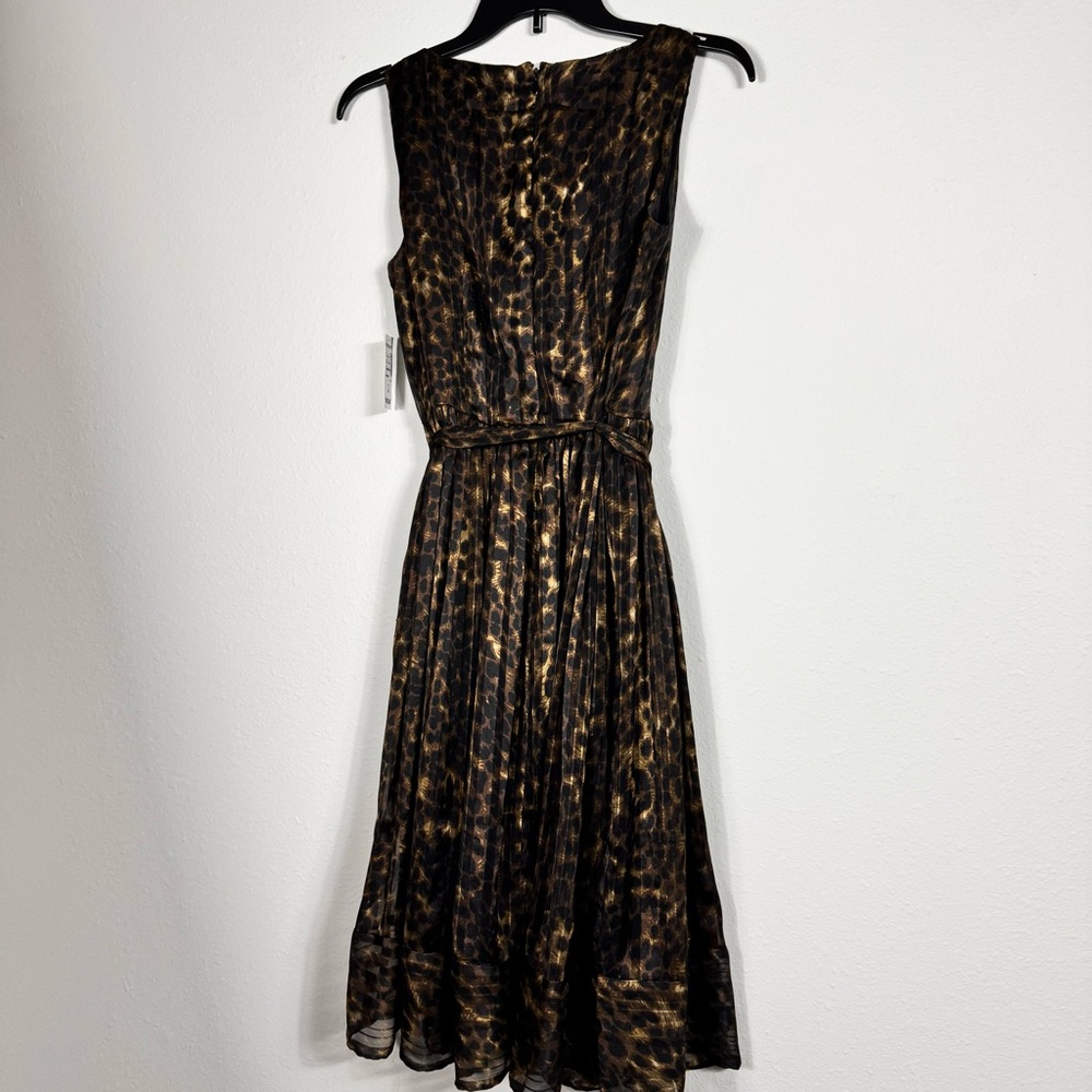 Carmen Mark Volvo Black Midi Dress with leopard Pattern with pockets.